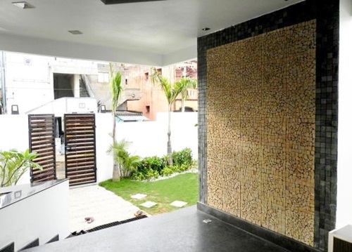 Wall cladding...wallpaper, fabric and wood!