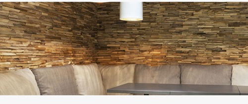 Wall cladding...wallpaper, fabric and wood!